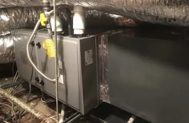 Horizontal high-efficiency furnace in the attic